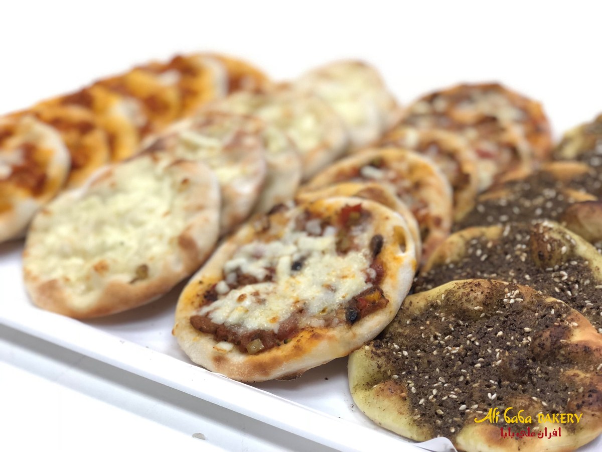 Platter of assorted mini Lebanese pies — meat, cheese and zaatar